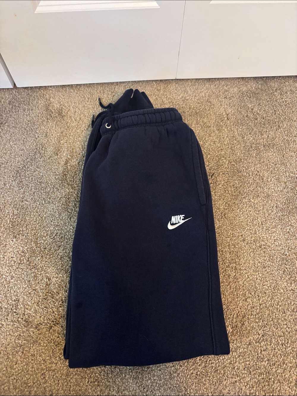 Nike Navy Sweatpants with White Swoosh Logo